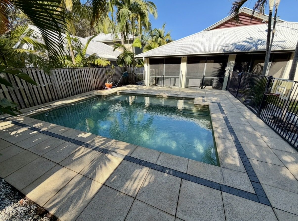 Crystal-clear backyard pool maintained by Blue Avenue Pools, Gold Coast